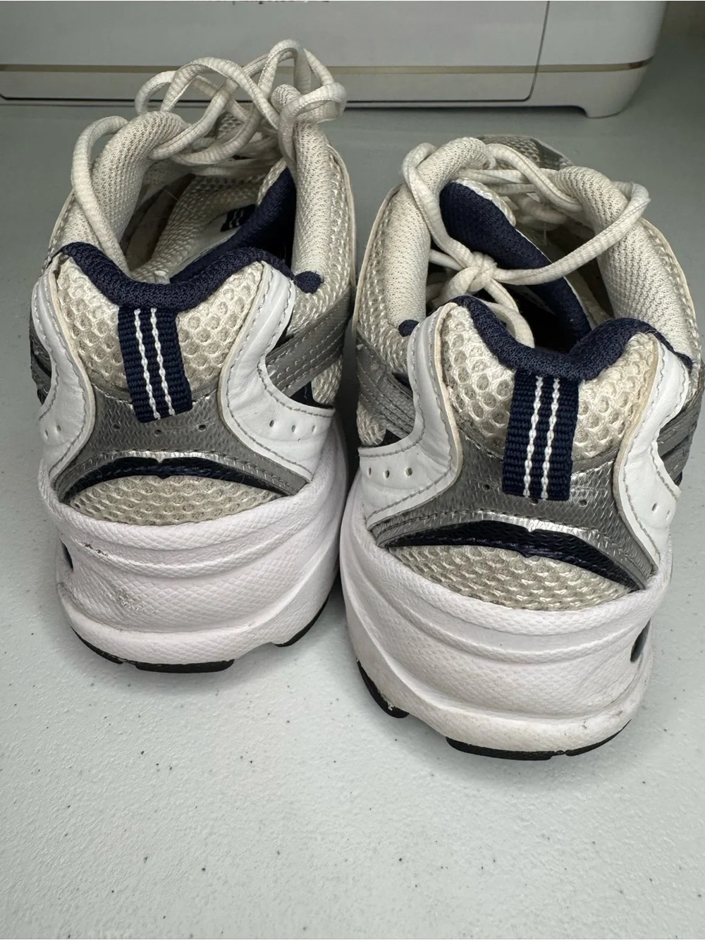 New Balance White and Silver Athletic Sneakers